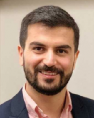 headshot of ali akbari
